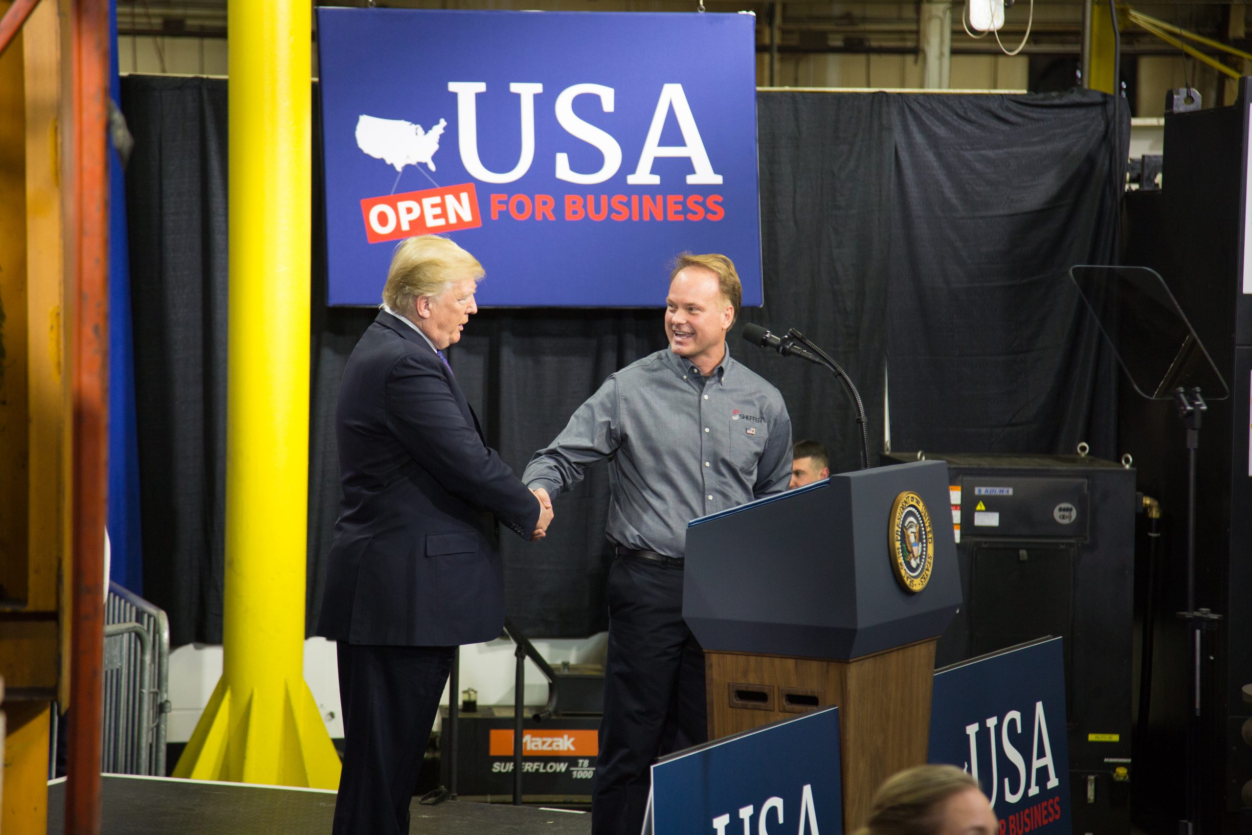 President Trump shaking hands with Jeff Norris at Sheffer Corporation, 2018